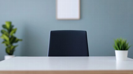 Modern minimalist office setup with empty chair and table, designed for focus
