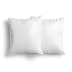 Soft white pillows with subtle striped pattern, perfect for any decor