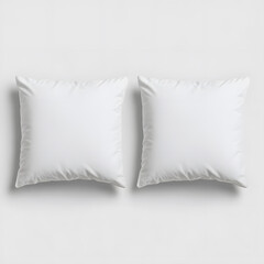 Soft white pillows with smooth textures, perfect for cozy decor
