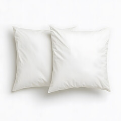 Soft white pillows placed side by side on minimal background