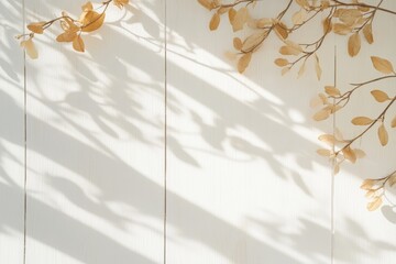 Elegant Shadows of Golden Leaves on Sunlit White Wood