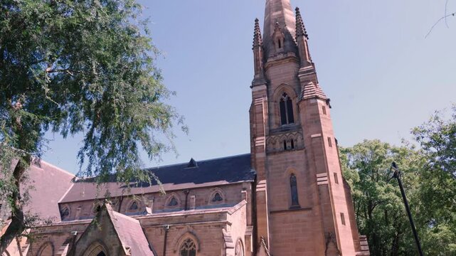 Gothic Old Church Tower In Sydney, New South Wales, Australia. tilt-up Shot