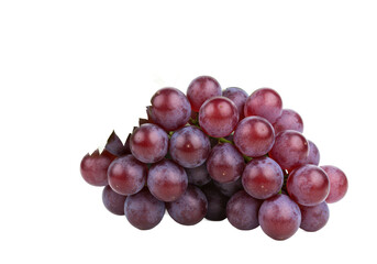 Cluster of fresh purple grapes with green leaves, isolated on white background