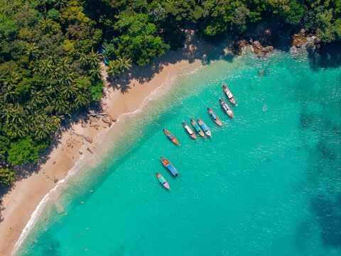 Aerial view Amazing travel landscape photo Thailand. Longtail boat in turquoise clear water paradise tropical banana beach Phuket