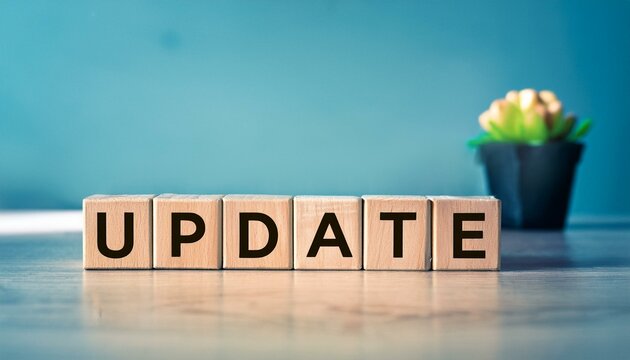 更新アップデートを意味する英単語のupdateの文字が書かれた木製のキューブブロック。AIで生成