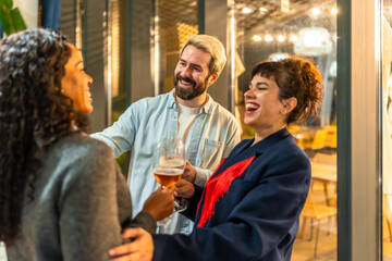 Friends congratulating a woman during night party