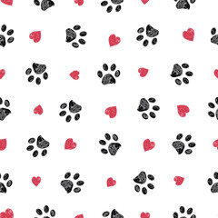 Fototapeta premium Hand drawn red hearts and paw prints. Seamless fabric design pattern