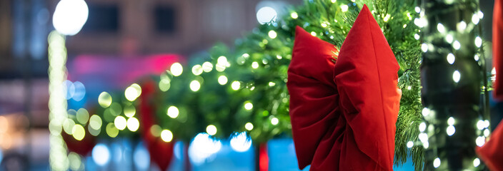 The city's New Year's decorations with bows and lights, New Year's mood in the city