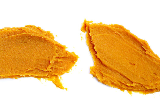 Japanese miso paste on white background.