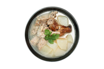 Stewed radish with roasted duck bones on isolate white background, Top view.