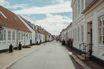 Street in  in Løgstør, Denmark with white houses