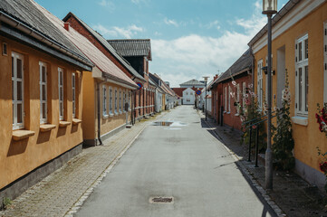 Street in  in Løgstør, Denmark with yellow houses
