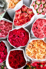 Red colourful flower buquets arranged together
