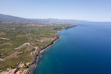 Obraz premium View from above of the coast in the Acireale area in Sicily