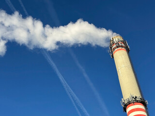 Smoking high chimneys of the power station