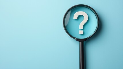 A magnifying glass focuses on a large question mark against a blue background, symbolizing inquiry and exploration of ideas.