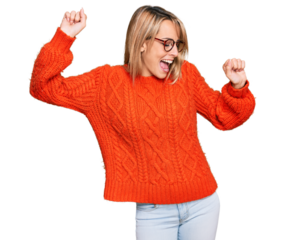 Beautiful blonde woman wearing casual clothes and glasses dancing happy and cheerful, smiling moving casual and confident listening to music