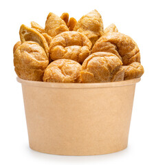 Crispy fried fish balls in a paper bowl,Fried fish balls isolate on white with clipping path.