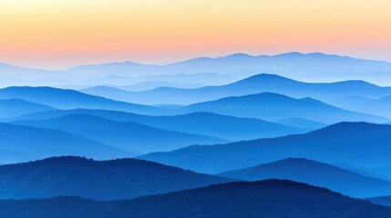 Serene mountain landscape at dawn with layered blue hues