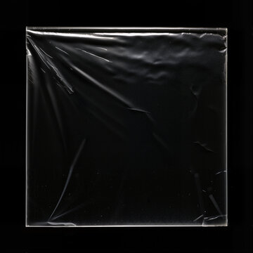 Transparent Square Plastic for Album Cover on Black Background 05