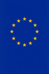 European union flag with twelve gold stars on a blue background for europe day celebration. Vertical banner. Copy space. Flag of EU. Flat illustration