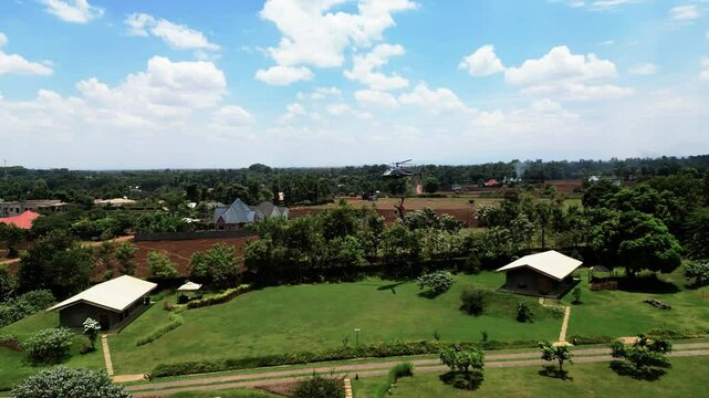 helicopter landing in the rural settlement of Africa Tanzania