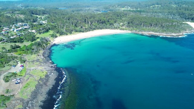 Drone aerial landscape Bawley Point sandy beach clear ocean water rocky headland reef Shoalhaven South Coast Australia vacation swimming holidays travel
