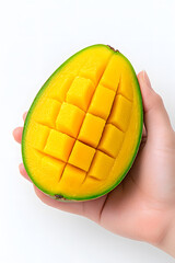 Mango cubes and mango slices isolated on a white background