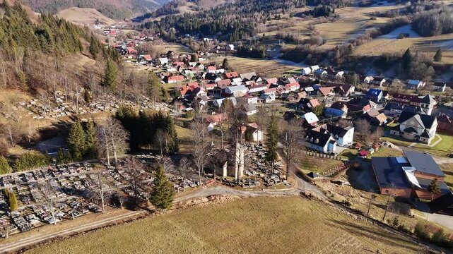 Aerial View of an Old Church in the Middle of a Cemetery in a Rural Landscape,Multiple Camera Angles
