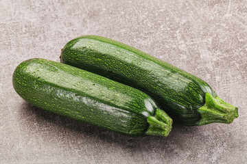 Raw green ripe zucchini vegetable