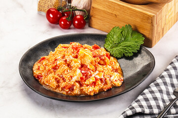 Shakshuka with tomato for breakfast