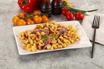 Italian pasta cellentani with anchovy