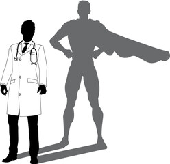 A superhero medical doctor man health care worker revealed by his shadow silhouette as a super hero in a cape.