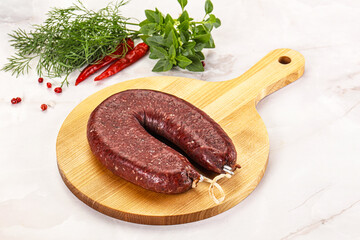 Delicious dry cured beef basturma on table, closeup