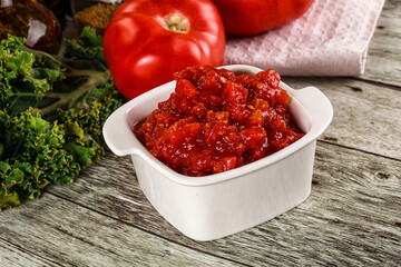 Diced ripe tomato with sauce