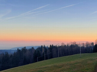 evening. View from Pohorje mountain. Fog and hills. Slovenia.