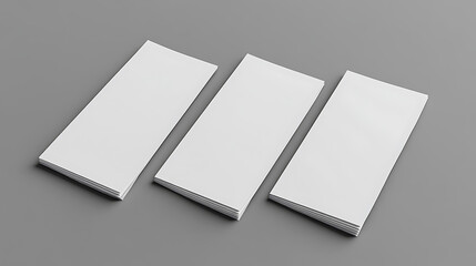 Three blank brochures on gray background, based on