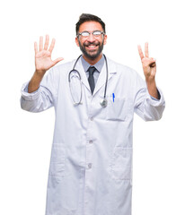 Fototapeta premium Adult hispanic doctor man over isolated background showing and pointing up with fingers number seven while smiling confident and happy.