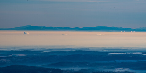 Obraz premium POlish part of Silesian Beskids and Babia hora hill from Praded hill in Jeseniky mountains in Czech republic