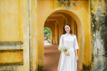 Vietnamese woman and landmark