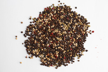 Peppercorn mix isolated on white background. Top view. Flat lay.