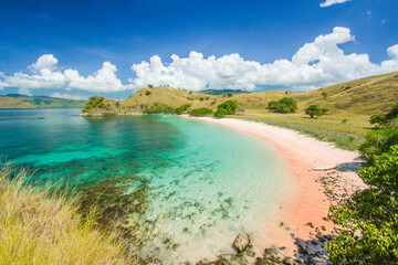 views of the vast blue sea and clear sea water and pink sand and
