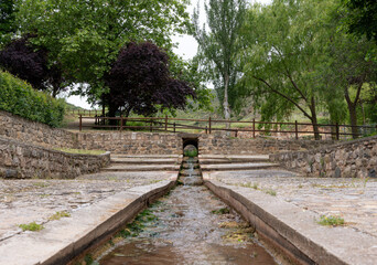 Water flow in the park. Poza de la Sal (Spain)