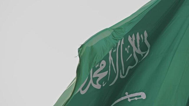 A flying flag of the Kingdom of Saudi Arabia
