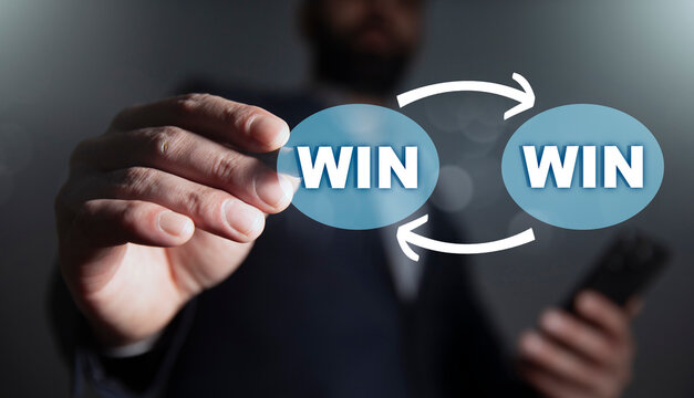 WIN WIN Businessman touching a touch screen - Powered by Adobe