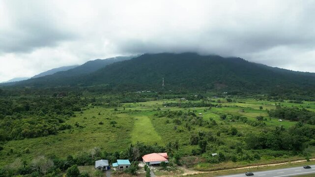 Aerial Drone View Of Pueh Village,With Paddy Field And Back Ground Mountain,Sarawak,Borneo,