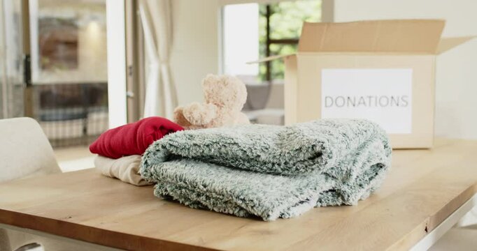 Donating cozy blankets and toys at home for Christmas charity