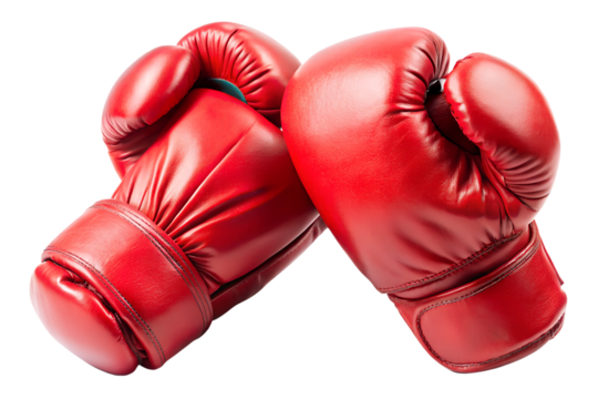 Red leather boxing gloves, essential equipment for boxers, symbolize the power, strength, and aggression of the sport