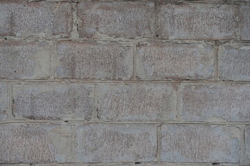 Closeup of whitewashed wall made of concrete masonry units