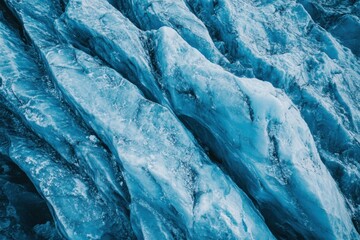 The image is of a large piece of ice with a blue hue